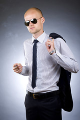 Image showing young businessman smoking 