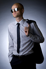 Image showing young businessman looking away