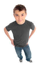 Image showing Boy hands on hips looking up at you