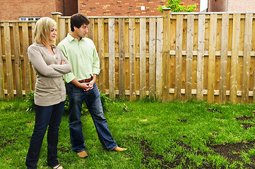 Image showing Couple concerned about lawn