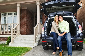 Image showing Couple sitting in back of car