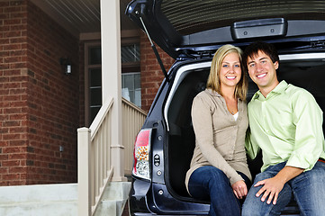 Image showing Couple sitting in back of car