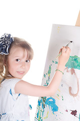 Image showing Little girl painting