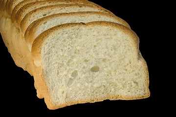 Image showing Slices of bread isolated on black background