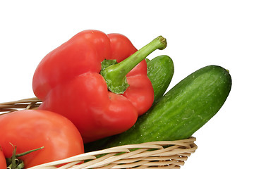 Image showing Basket with vegetables on white background with clipping path