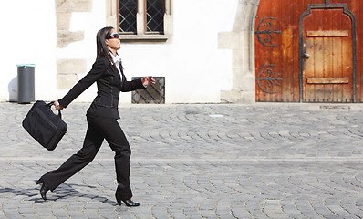 Image showing Businesswoman in a hurry