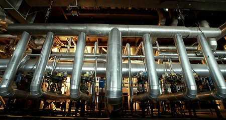 Image showing Equipment, cables and piping as found inside of a modern industr