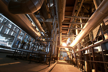 Image showing Equipment, cables and piping as found inside of a modern industr