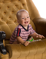 Image showing baby in big armchair