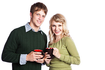 Image showing Caucasian couple holding coffee cups