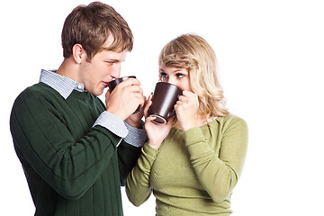 Image showing Caucasian couple holding coffee cups