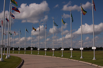 Image showing road with many flags