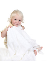 Image showing Playful Kid Holding a Bath Towel Smiling