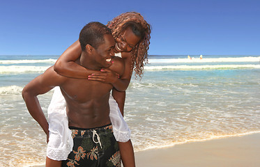 Image showing Loving Couple Playing Along the Beach