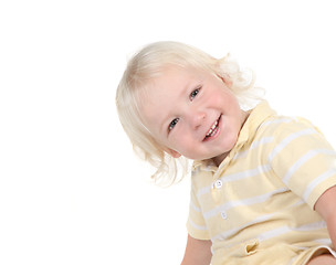 Image showing Goofy Happy Smiling Toddler Looking While Leaning Over