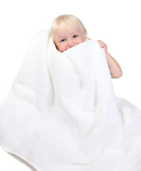 Image showing Adorable Happy Baby Boy Holding Towel to His Face Smiling