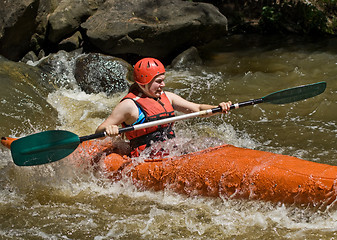 Image showing teenage girl white water kayaking