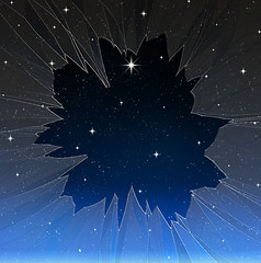 Image showing bright star through smashed window
