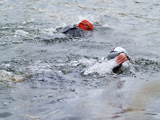 Image showing two triathltes swimming