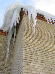 Image showing Big icicles on the roof