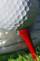 Image showing Golf club and ball in grass