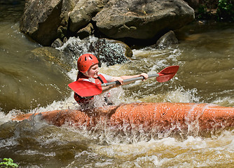 Image showing teenage girl white water kayaking