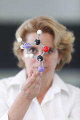 Image showing Female Researcher Analyzing A Molecular Structure