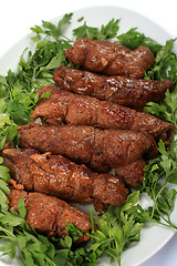 Image showing Beef olives and parsley vertical