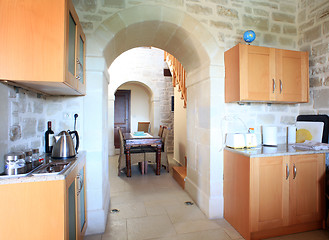 Image showing Villa kitchen and dining area