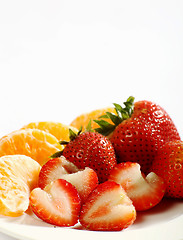 Image showing Strawberries and tangerines