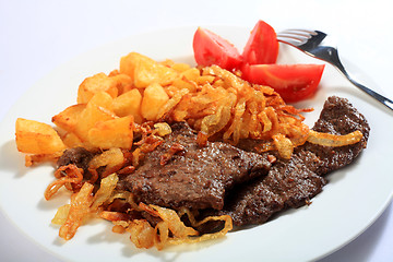 Image showing Beef escalopes with crispy onions horizontal