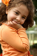 Image showing Pretty little girl smiling outdoors