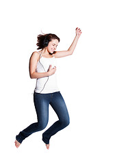 Image showing Beautiful woman jumping for joy