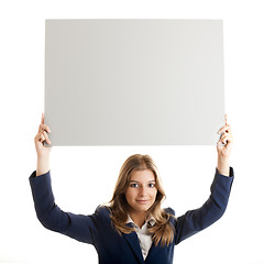 Image showing Business Woman holding a billboard