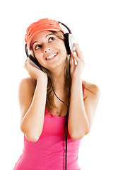 Image showing Young woman listen music