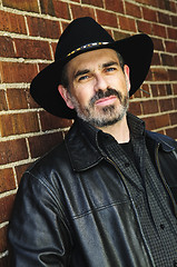 Image showing Bearded man in cowboy hat