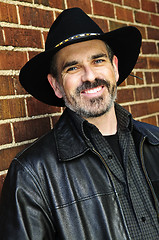 Image showing Bearded man in cowboy hat