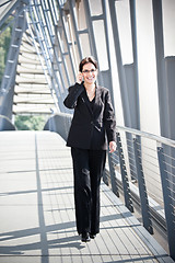 Image showing Hispanic businesswoman on the phone