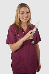 Image showing Nurse with big syringe