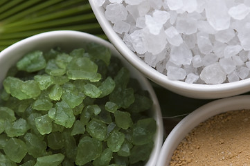 Image showing bath salt and palm leaf