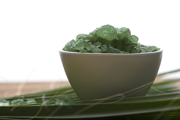 Image showing bath salt and palm leaf