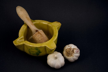 Image showing Mortar with garlic.