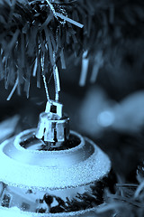 Image showing Christmas ornaments on tree.