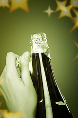 Image showing Opening champagne bottle