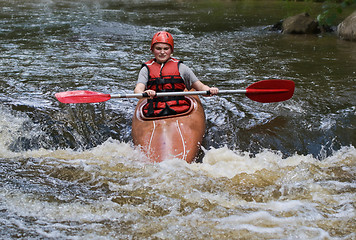 Image showing teenage girl white water kayaking