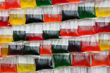 Image showing Plastic bags filled with juice.