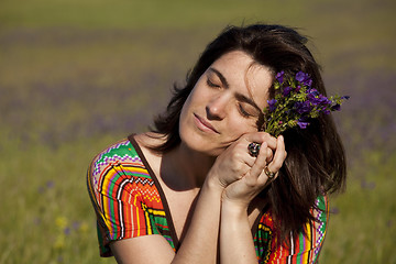 Image showing Enjoying fresh spring flowers