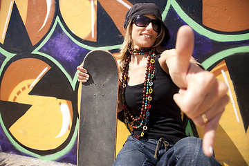 Image showing Cool skateboard woman