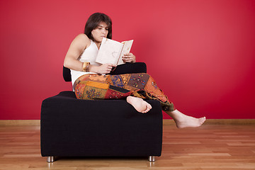 Image showing Woman reading a book