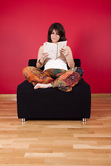 Image showing Woman reading a book